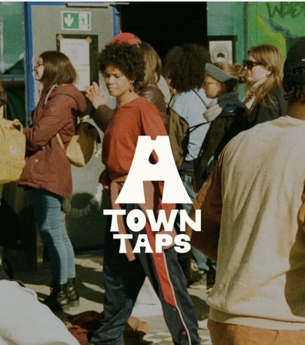 Gwen Moye smiling in a hat